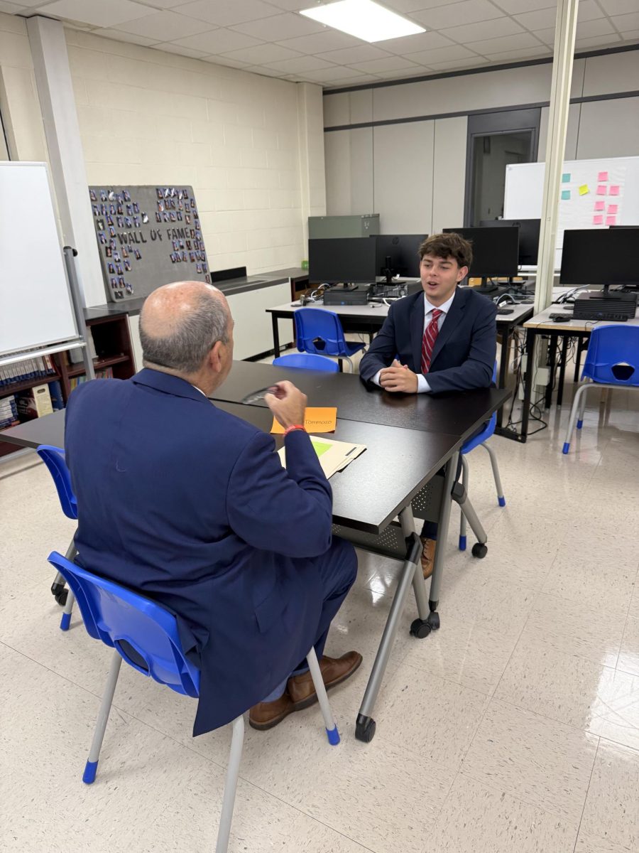 Superintendent DeTommaso with Senior Sean Smith